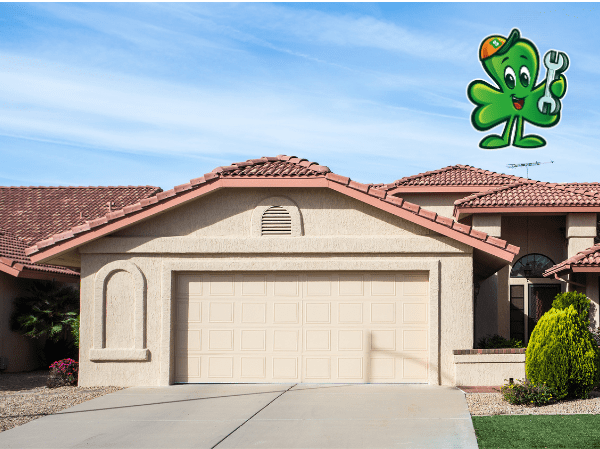 Residential home in Tempe, Arizona with a garage, featuring a Shamrock Heating & Cooling logo, symbolizing reliable heating repair services.
